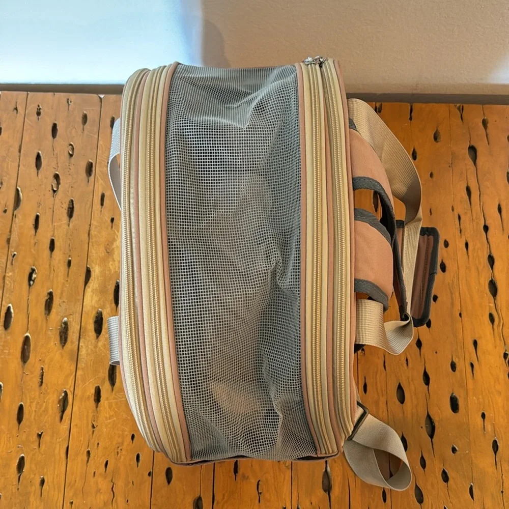 Backpack dog carrier.